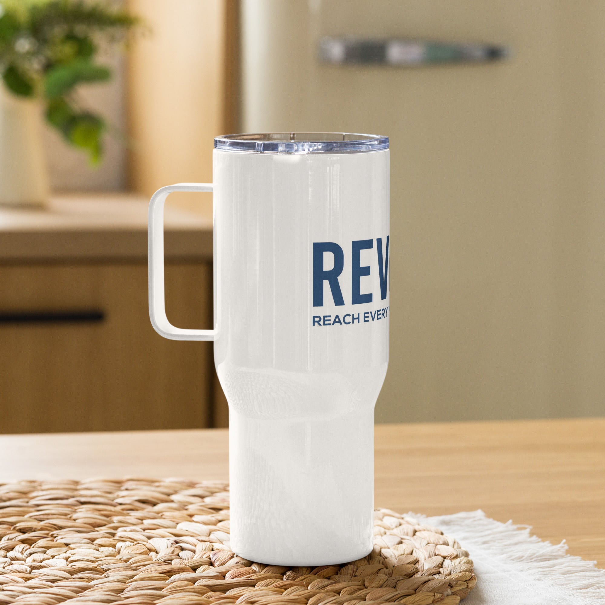 Revolt Scales Blue Font Travel mug with a handle